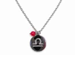Colgante del horóscopo Libra en acero inoxidable plateado con glifo calado y bola de ágata rosa