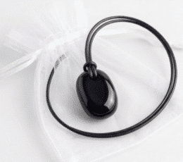 Colgante rodado onix negro agujero