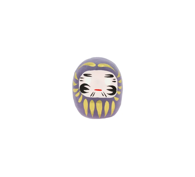 Daruma japonés violeta, amuleto de la longevidad y la salud